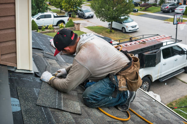 Professional Roofing technician working in Mead, WA